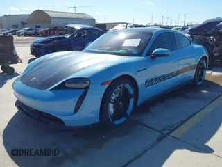 2022 Porsche Taycan with VIN WP0AA2Y10NSA10908, listed as a IAAI auction lot 42257582 with 23,806 mi miles and . Bid and sale history available at DreamBid. Image 2.
