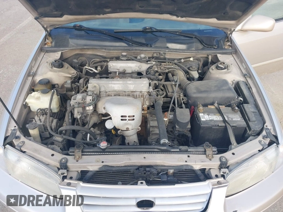 1998 Toyota Camry LE z VIN 4T1BG22K0WU232402, wystawiony jako IAAI lot #42274322 z przebiegiem 222 286 mil mil oraz . Historia ofert i sprzedaży dostępna na DreamBid. Obrazek 10.