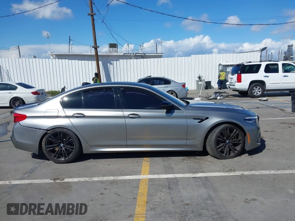 2020 BMW M5 Competition z VIN WBSJF0C05LB448878, wystawiony jako IAAI lot #41796245 z przebiegiem 62 856 mil mil oraz . Historia ofert i sprzedaży dostępna na DreamBid. Obrazek 12.