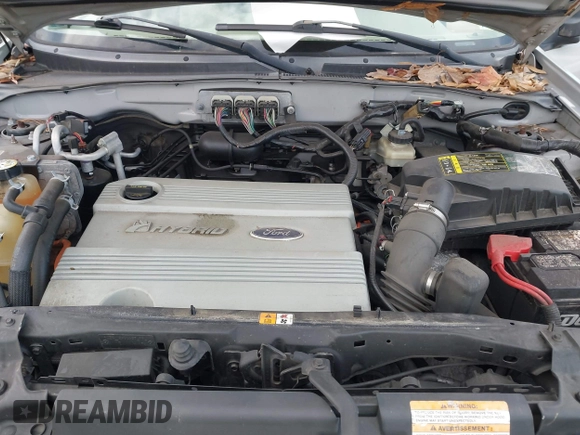 2007 Mercury Mariner with VIN 4M2CU39H97KJ18357, listed as a IAAI auction lot 41378708 with 118,381 mi miles. Bid and sale history available at carsss.com. Image 10.