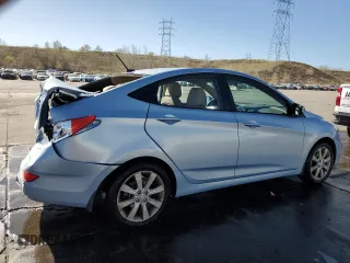 2012 Hyundai Accent GLS with VIN KMHCU4AE6CU185988, listed as a Copart auction lot 53572835 with 105,200 mi miles and Salvage Title. Bid and sale history available at carsss.com. Image 3.