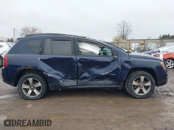 2016 Jeep Compass High Altitude Edition with VIN 1C4NJDEB0GD696124, listed as a IAAI auction lot 41973334 with 67,056 mi miles. Bid and sale history available at carsss.com. Image 14.