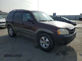 2002 Mazda Tribute LX with VIN 4F2CU08172KM34759, listed as a Copart auction lot 81631974 with 254,286 mi miles and Salvage Title. Bid and sale history available at carsss.com. Image 4.
