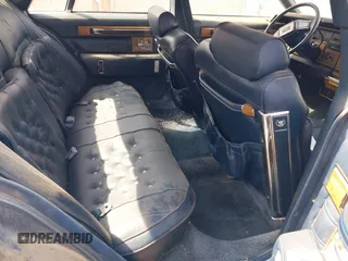 1985 Cadillac Seville z VIN 1G6KS698XFE804240, wystawiony jako IAAI lot #42125052 z przebiegiem 11 322 mil mil oraz . Historia ofert i sprzedaży dostępna na DreamBid. Obrazek 8.