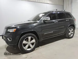 2014 Jeep Grand Cherokee Overland with VIN 1C4RJFCGXEC153250, listed as a Copart auction lot 51327195 with 132,282 mi miles and Clean Title. Bid and sale history available at DreamBid. Image 1.
