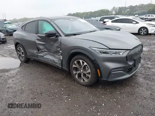 2023 Ford Mustang Mach-E Premium z VIN 3FMTK3SU4PMA76915, wystawiony jako IAAI lot #42350153 z przebiegiem 3 957 mil mil oraz . Historia ofert i sprzedaży dostępna na DreamBid. Obrazek 1.