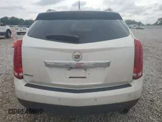 2012 Cadillac SRX Performance Collection z VIN 3GYFNBE32CS615988, wystawiony jako Copart lot #61198415 z przebiegiem 156 135 mil mil oraz Szkoda całkowita • Salvage title. Historia ofert i sprzedaży dostępna na DreamBid. Obrazek 6.