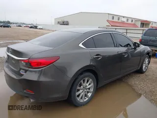 2017 Mazda 6 Sport with VIN JM1GL1U55H1108606, listed as a IAAI auction lot 41606526 with 143,968 mi miles and . Bid and sale history available at DreamBid. Image 4.