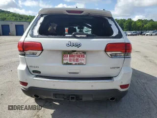 2014 Jeep Grand Cherokee Limited with VIN 1C4RJFBGXEC325357, listed as a Copart auction lot 61993715 with 156,718 mi miles and Salvage title. Bid and sale history available at DreamBid. Image 6.