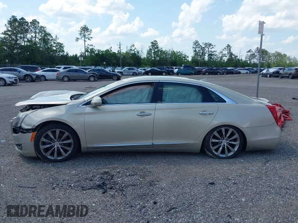 2014 Cadillac XTS z VIN 2G61L5S39E9159583, wystawiony jako IAAI lot #36024597 z przebiegiem 118 461 mil mil oraz . Historia ofert i sprzedaży dostępna na DreamBid. Obrazek 13.
