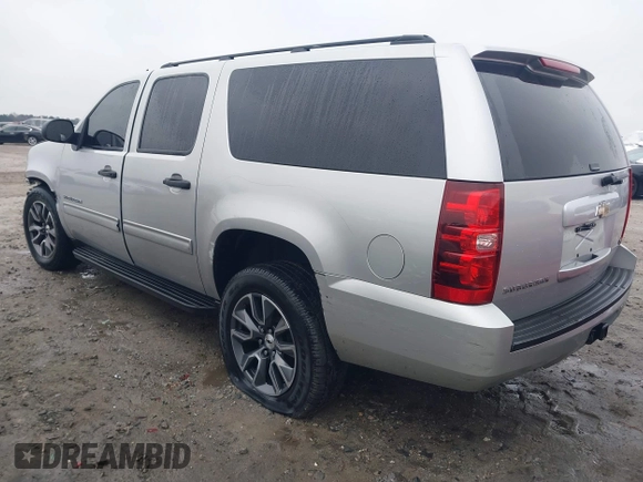 2010 Chevrolet Suburban LS with VIN 1GNUKHE37AR193670, listed as a IAAI auction lot 41415863 with 213,371 mi miles and . Bid and sale history available at DreamBid. Image 3.