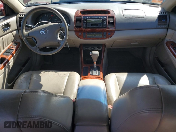 2004 Toyota Camry LE with VIN 4T1BE30KX4U297754, listed as a Copart auction lot 50795425 with 184,152 mi miles and Salvage Title. Bid and sale history available at DreamBid. Image 8.