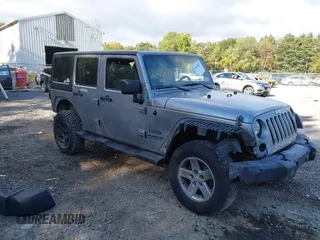 2016 Jeep Wrangler Unlimited Sport with VIN 1C4BJWDG2GL281985, listed as a IAAI auction lot 40518617 with 105,415 mi miles and . Bid and sale history available at DreamBid. Image 1.
