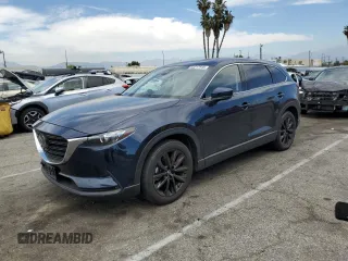 2023 Mazda CX-9 Touring Plus with VIN JM3TCBAY1P0649490, listed as a Copart auction lot 52217915 with 20,716 mi miles and Salvage title. Bid and sale history available at DreamBid. Image 1.