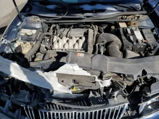 2002 Lincoln Continental with VIN 1LNHM97V82Y612492, listed as a Copart auction lot 38197414 with 198,537 mi miles and Salvage Title. Bid and sale history available at carsss.com. Image 11.