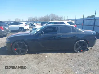 2020 Dodge Charger SXT with VIN 2C3CDXBG2LH229627, listed as a IAAI auction lot 41596342 with 124,012 mi miles and . Bid and sale history available at DreamBid. Image 14.