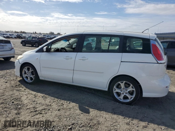 2009 Mazda 5 Grand Touring with VIN JM1CR29L290329503, listed as a Copart auction lot 78183844 with 118,798 mi miles and Salvage title. Bid and sale history available at DreamBid. Image 2.