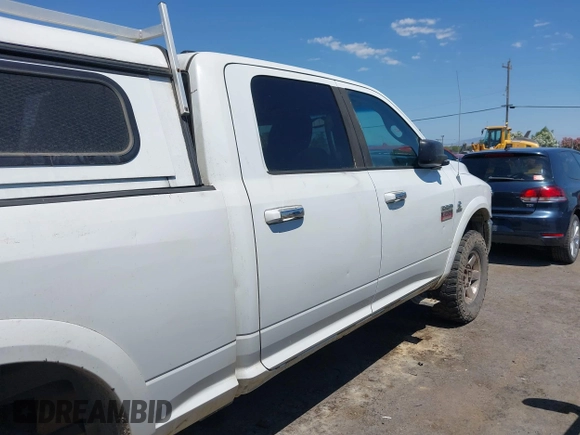 2012 Ram 2500 Laramie with VIN 3C6UD5FL1CG309889, listed as a IAAI auction lot 42484013 with 245,986 mi miles and . Bid and sale history available at DreamBid. Image 13.