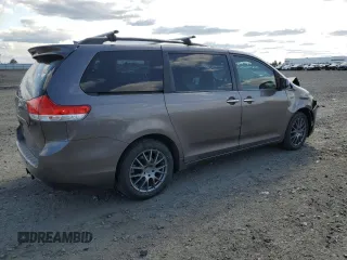 2011 Toyota Sienna XLE with VIN 5TDDK3DC2BS028058, listed as a Copart auction lot 54374215 with 216,905 mi miles and Salvage Title. Bid and sale history available at DreamBid. Image 3.