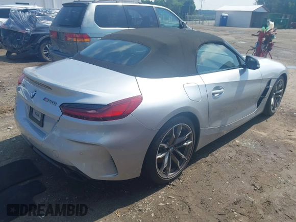 2021 BMW Z4 sDriveM40i z VIN WBAHF9C00MWX17614, wystawiony jako IAAI lot #42277354 z przebiegiem 26 615 mil mil oraz . Historia ofert i sprzedaży dostępna na DreamBid. Obrazek 4.