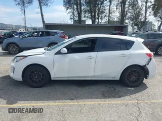 2012 Mazda Mazda3 i Touring with VIN JM1BL1L82C1695636, listed as a IAAI auction lot 41812909 with 199,314 mi miles. Bid and sale history available at carsss.com. Image 14.