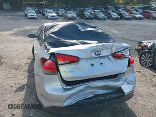 2018 Kia Forte LX z VIN 3KPFK4A79JE168946, wystawiony jako IAAI lot #37465651 z przebiegiem 95 309 mil mil oraz . Historia ofert i sprzedaży dostępna na DreamBid. Obrazek 6.