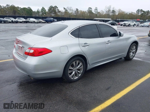 2013 Infiniti M with VIN JN1BY1AP4DM513899, listed as a IAAI auction lot 41854573 with 202,480 mi miles and . Bid and sale history available at carsss.com. Image 4.