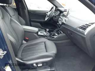 2023 BMW X4 xDrive30i z VIN 5UX33DT01P9P86340, wystawiony jako IAAI lot #42113558 z przebiegiem 27 226 mil mil oraz . Historia ofert i sprzedaży dostępna na DreamBid. Obrazek 5.
