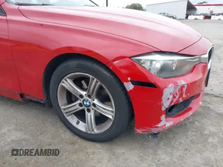 2013 BMW 3 Series 328i with VIN WBA3A5C51DF353779, listed as a IAAI auction lot 42036730 with 133,674 mi miles. Bid and sale history available at carsss.com. Image 6.