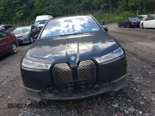 2023 BMW iX xDrive50 with VIN WB523CF05PCL62449, listed as a Copart auction lot 57069783 with 0 mi miles. Bid and sale history available at carsss.com. Image 5.