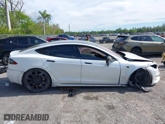 2020 Tesla Model S Long Range with VIN 5YJSA1E2XLF360260, listed as a IAAI auction lot 41241778 with 141,594 mi miles. Bid and sale history available at carsss.com. Image 13.