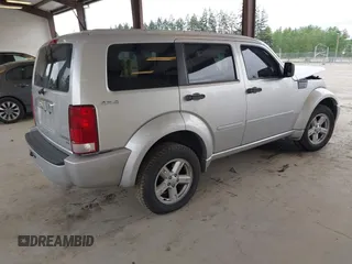 2011 Dodge Nitro SXT z VIN 1D4PU5GK8BW579099, wystawiony jako IAAI lot #42141424 z przebiegiem 92 726 mil mil oraz . Historia ofert i sprzedaży dostępna na DreamBid. Obrazek 4.