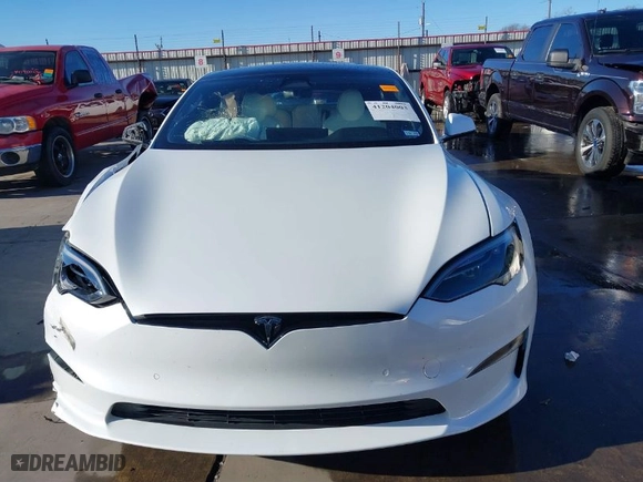 2022 Tesla Model S Plaid with VIN 5YJSA1E63NF483873, listed as a IAAI auction lot 41204003 with 15 mi miles. Bid and sale history available at carsss.com. Image 12.