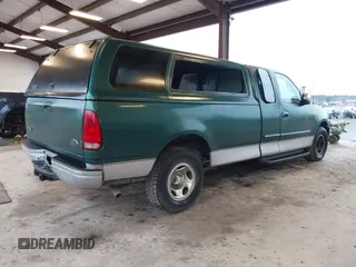 1999 Ford F-150 with VIN 2FTRX17L9XCA19030, listed as a IAAI auction lot 41232157 with Not provided miles and . Bid and sale history available at DreamBid. Image 4.
