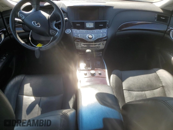 2012 Infiniti M37 with VIN JN1BY1AP5CM330588, listed as a Copart auction lot 70862854 with 112,427 mi miles and Salvage Title. Bid and sale history available at carsss.com. Image 8.