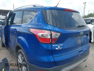 2017 Ford Escape Titanium with VIN 1FMCU0JD3HUE35131, listed as a IAAI auction lot 42062019 with 108,470 mi miles and . Bid and sale history available at DreamBid. Image 3.
