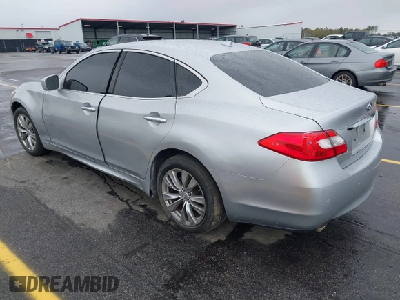 2013 Infiniti M with VIN JN1BY1AP4DM513899, listed as a IAAI auction lot 41854573 with 202,480 mi miles and . Bid and sale history available at carsss.com. Image 3.