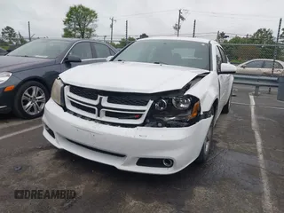 2013 Dodge Avenger SXT with VIN 1C3CDZCG9DN772959, listed as a IAAI auction lot 41971187 with 121,530 mi miles and . Bid and sale history available at carsss.com. Image 6.