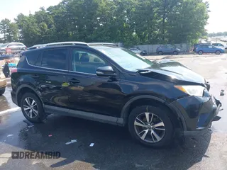 2016 Toyota RAV4 XLE with VIN 2T3RFREV9GW458057, listed as a IAAI auction lot 42651373 with 119,750 mi miles and . Bid and sale history available at DreamBid. Image 13.