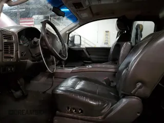 2005 Nissan Titan SE z VIN 1N6AA06BX5N502595, wystawiony jako Copart lot #85888184 z przebiegiem 231 851 mil mil oraz Nie do naprawy • Non repairable. Historia ofert i sprzedaży dostępna na DreamBid. Obrazek 7.