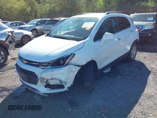2020 Chevrolet Trax LT with VIN KL7CJLSB9LB005813, listed as a IAAI auction lot 41802888 with 31,212 mi miles and . Bid and sale history available at DreamBid. Image 2.