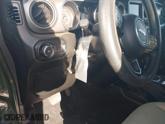 2023 Jeep Wrangler Unlimited Willys Sport with VIN 1C4HJXDM0PW515898, listed as a IAAI auction lot 41419267 with 10,964 mi miles and . Bid and sale history available at DreamBid. Image 20.