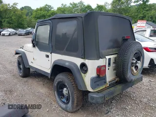 1998 Jeep Wrangler SE with VIN 1J4FY29P0WP792787, listed as a IAAI auction lot 42631661 with 190,180 mi miles and . Bid and sale history available at DreamBid. Image 3.