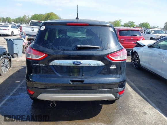 2013 Ford Escape SEL with VIN 1FMCU9H94DUA10002, listed as a IAAI auction lot 41963247 with 85,941 mi miles. Bid and sale history available at carsss.com. Image 16.