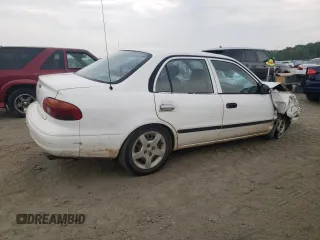 2000 Chevrolet Prizm z VIN 1Y1SK5281YZ415530, wystawiony jako Copart lot #60704824 z przebiegiem Nie podano mil oraz Szkody całkowita. Historia ofert i sprzedaży dostępna na DreamBid. Obrazek 3.