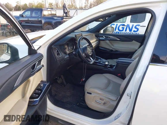 2016 Mazda CX-9 Grand Touring z VIN JM3TCADY4G0124588, wystawiony jako IAAI lot #41192549 z przebiegiem 161 272 mil mil oraz . Historia ofert i sprzedaży dostępna na DreamBid. Obrazek 5.