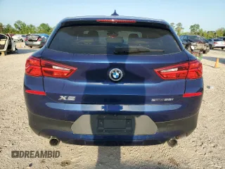 2018 BMW X2 sDrive28i with VIN WBXYJ3C35JEJ89968, listed as a Copart auction lot 52626525 with 68,945 mi miles and Salvage title. Bid and sale history available at DreamBid. Image 6.