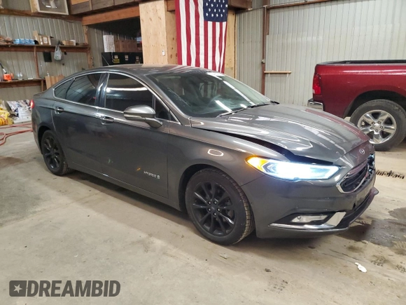 2017 Ford Fusion Hybrid SE z VIN 3FA6P0LU4HR226127, wystawiony jako Copart lot #50496455 z przebiegiem 98 027 mil mil oraz Szkoda całkowita • Salvage title. Historia ofert i sprzedaży dostępna na DreamBid. Obrazek 4.