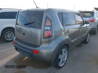 2011 Kia Soul + with VIN KNDJT2A27B7215666, listed as a IAAI auction lot 41600060 with 185,480 mi miles. Bid and sale history available at carsss.com. Image 4.