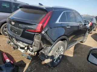 2019 Cadillac XT4 AWD Premium Luxury with VIN 1GYFZDR4XKF170289, listed as a Copart auction lot 52112025 with 100,524 mi miles and Salvage Title. Bid and sale history available at carsss.com. Image 3.
